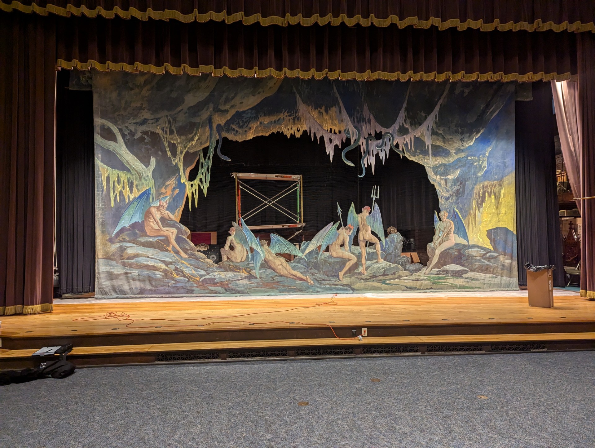 Large hand-painted cave scene dry pigment stage drop from the 1920s