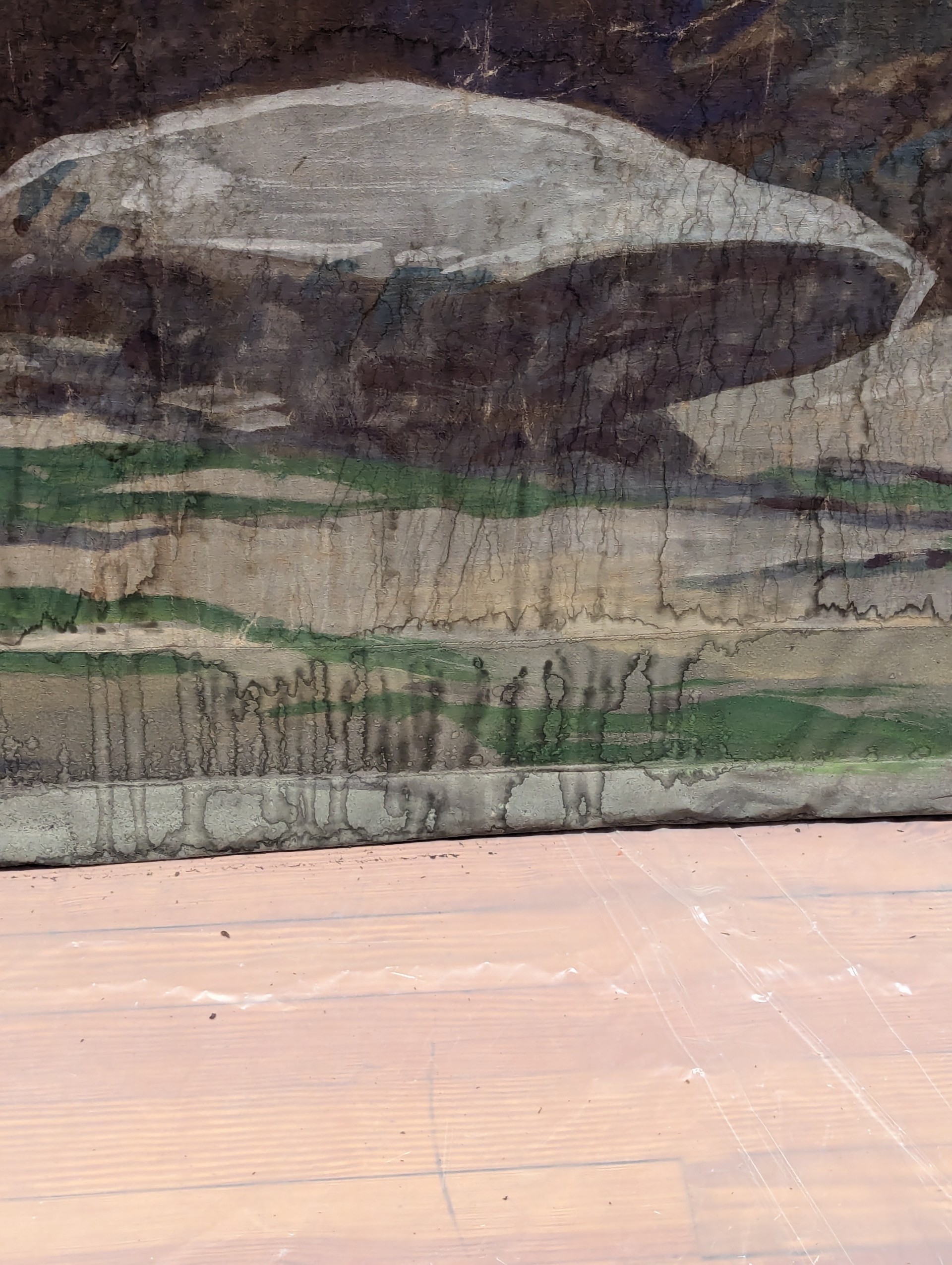 Close-up detail of a cracked 1920s dry pigment painted canvas drop